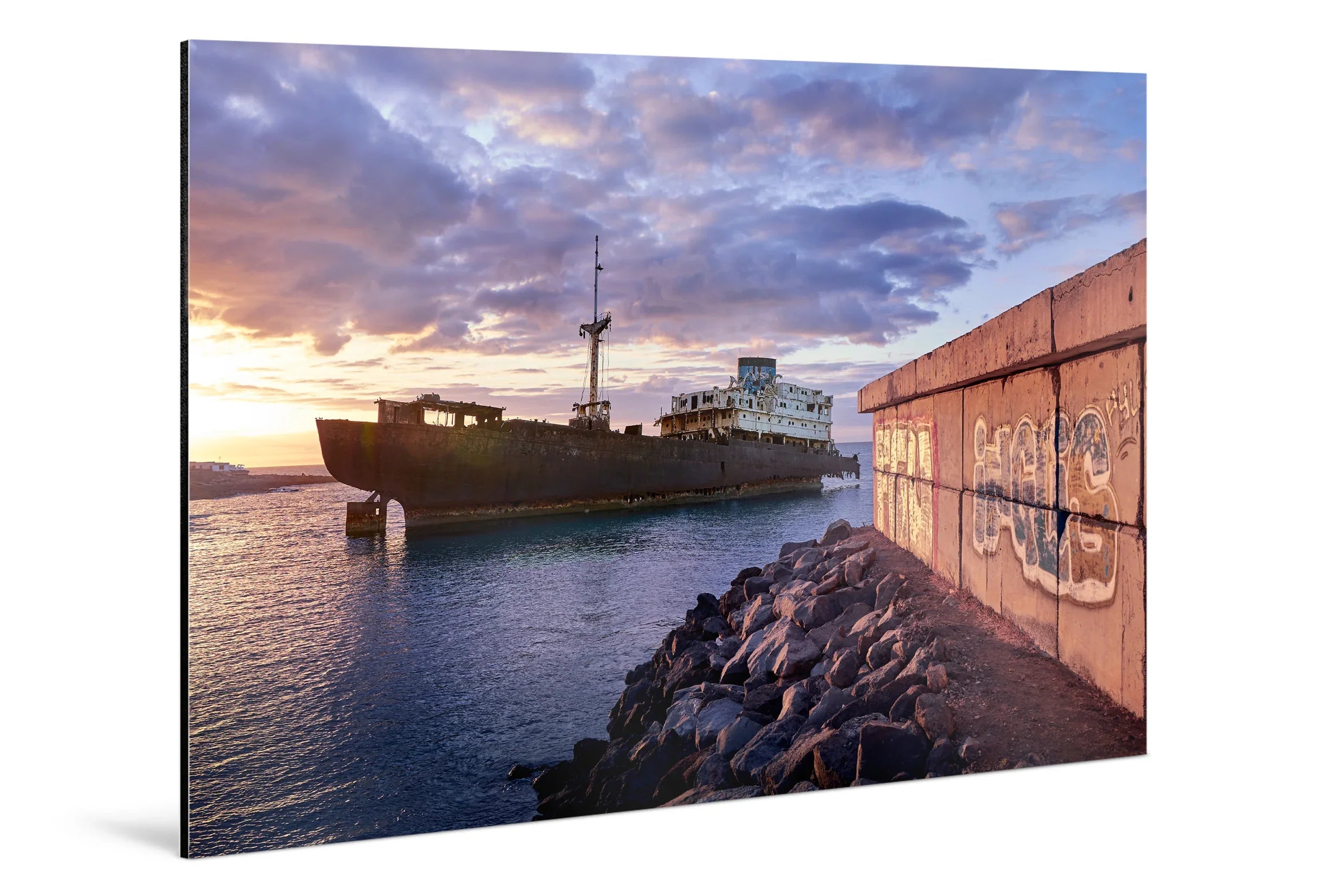 Abandoned ship floating near rocky shore under dramatic blue hour sky with clouds at dusk. - 45 x 30cm / Photo hinter Acrylglas / Unframed