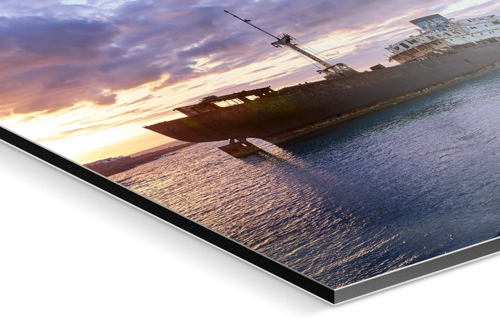 Rustic shipwreck silhouette on vibrant blue-hour sky over calm sea, Lanzarote coastscape. - 45 x 30cm / Photo hinter Acrylglas / Unframed
