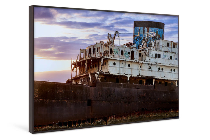 Rusty abandoned shipwreck with a weathered blue cabin under a cloudy blue hour sky. - 45 x 30cm / Photo hinter Acrylglas / Unframed