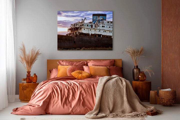 Abandoned rusty shipwreck on rocky shore under dramatic blue hour sky with clouds. - 45 x 30cm / Photo hinter Acrylglas / Unframed